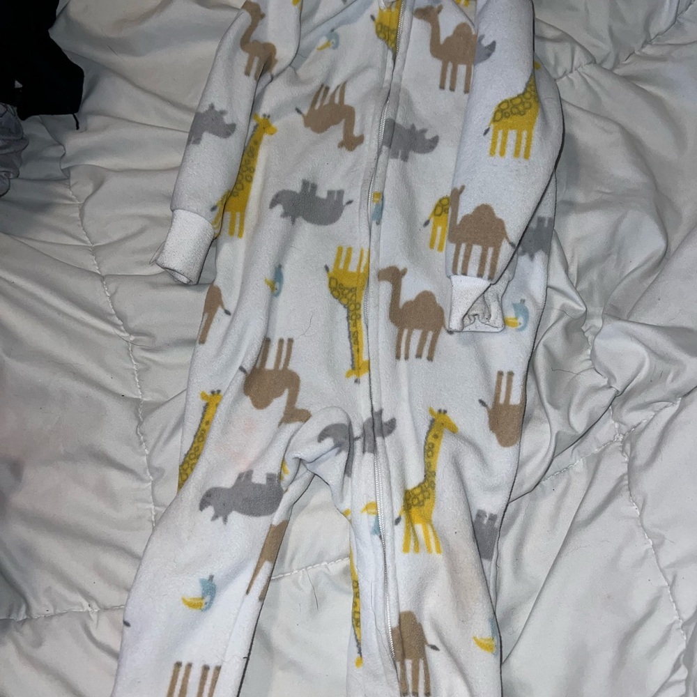 Carters footie pajamas! Perfect and cozy for little one. Unisex